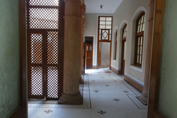 Conserved hallway around back courtyard on first floor